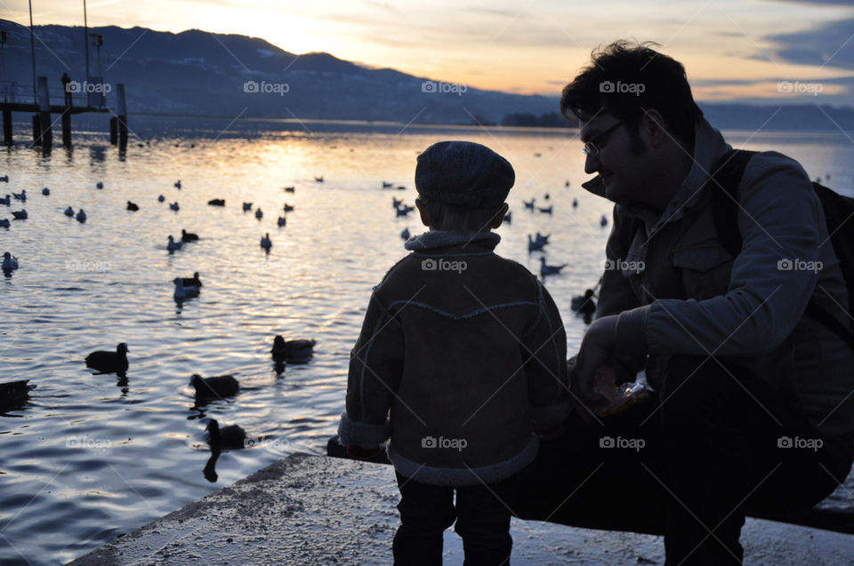 sun water lake night by nivoa