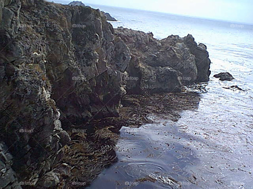 Cliff rock formation overlooking water