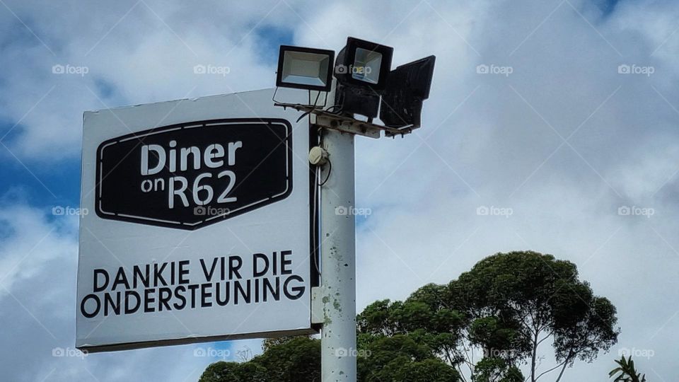 landmark sign next to a roadside diner on the way to cape Town south Africa.