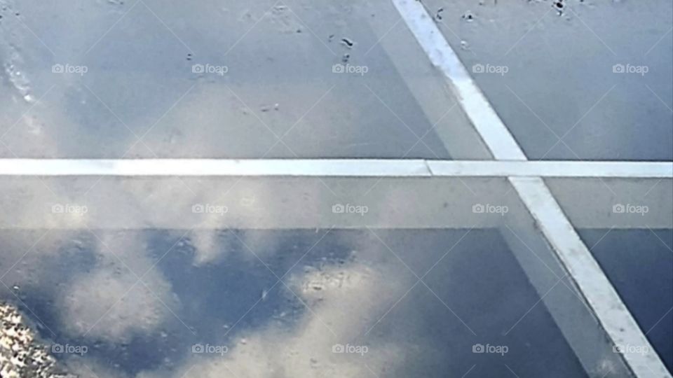 the reflection of the cloud at the wet roof top after raining, looks amazing..