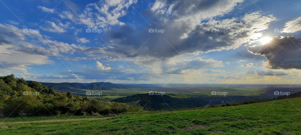 dramatic sky over hills