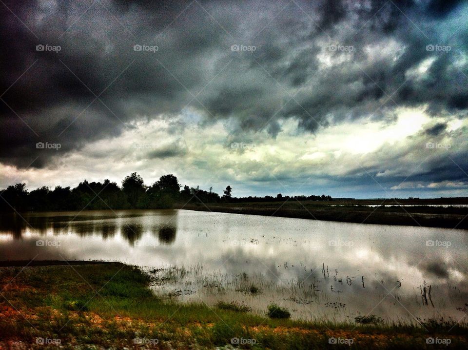 Cloudy over water