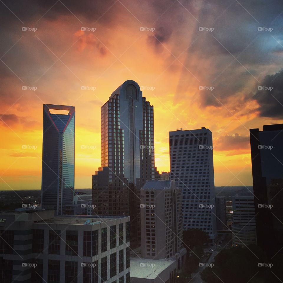 Rooftop Charlotte . Watching the skies turn golden in Uptown Charlotte. 