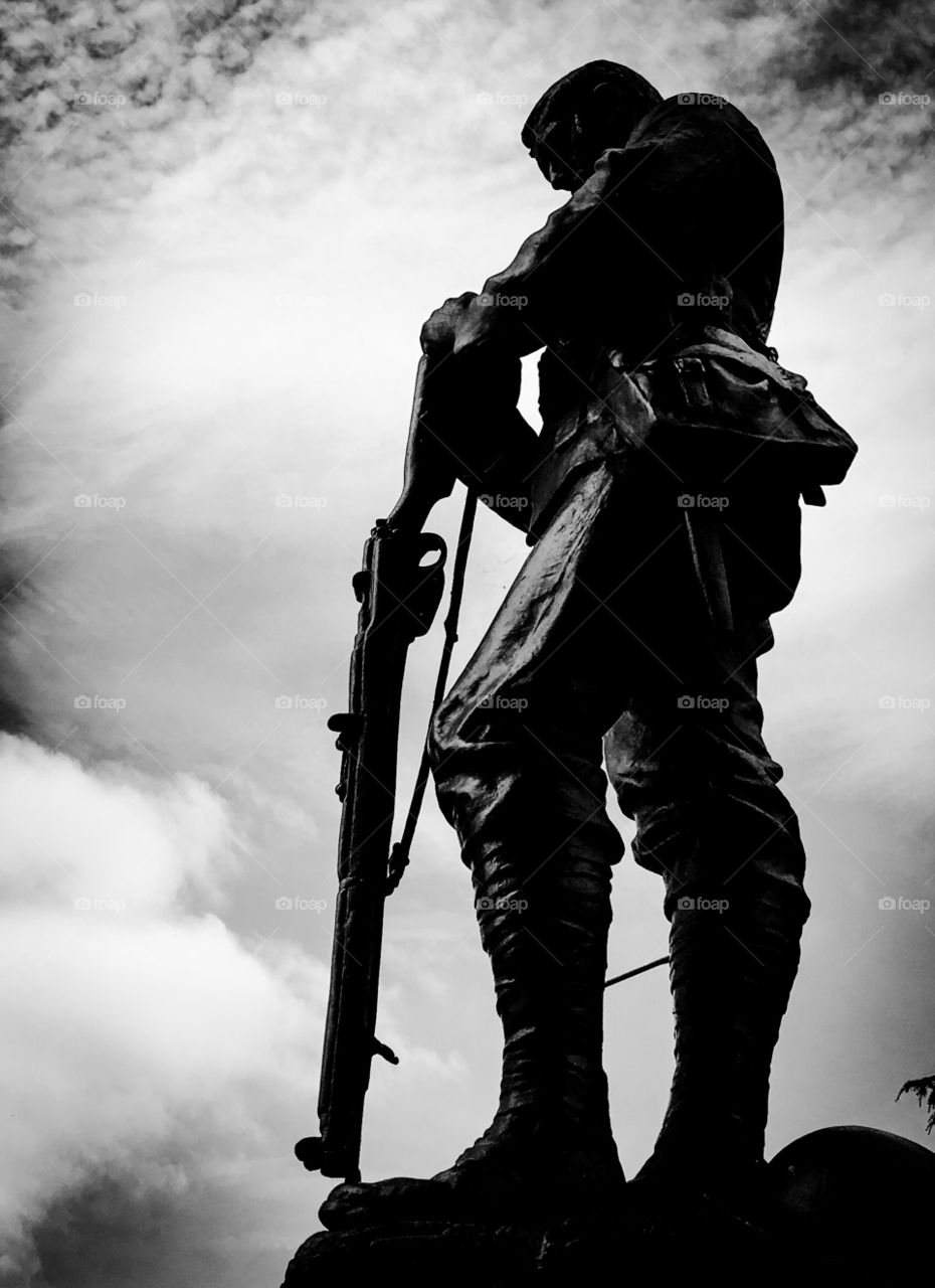 Army soldier statue with holding weapon