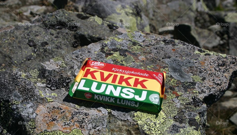 Relax at the top of Bitihorn with Kvikk Lunsj chocolate 
