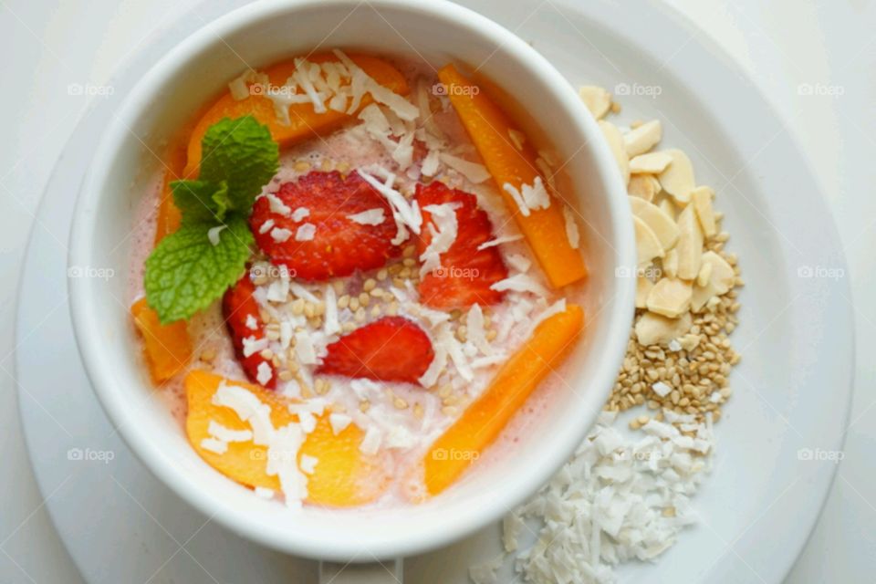 Fresh fruits smoothie -strawberry,  peach, coconut, sesame