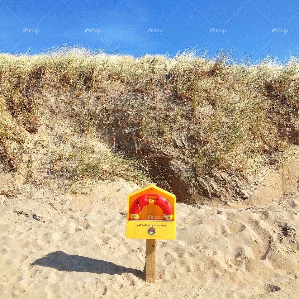 Life bouy. Life bouy on a beach