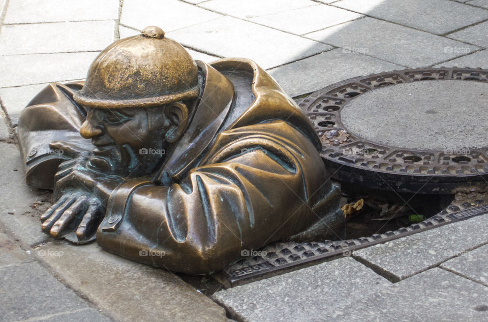 Man in a hole in Bratislava. 