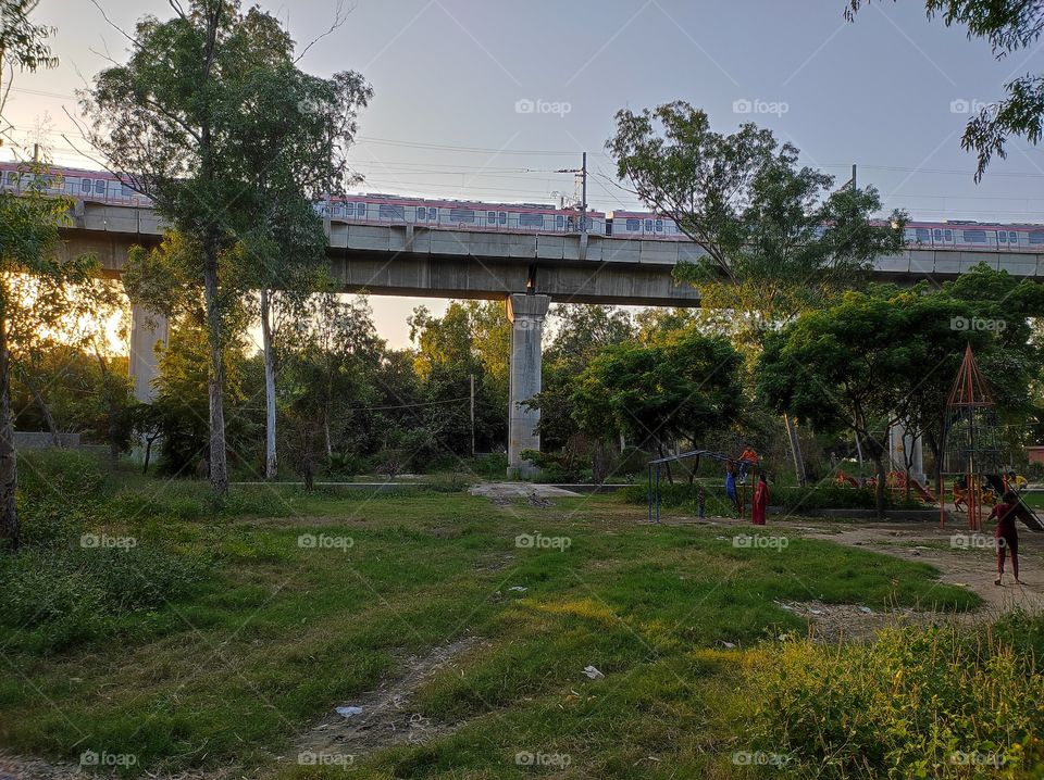 Metro passes through a park