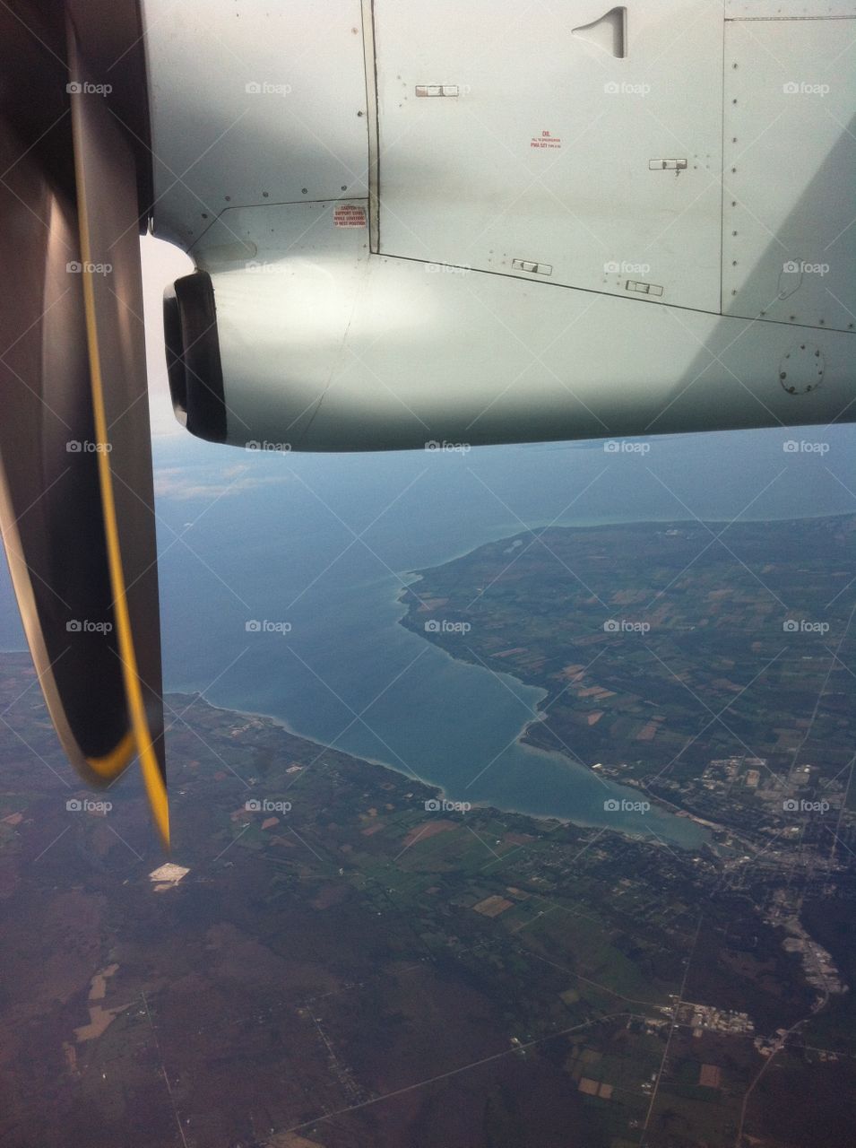 Soaring above Ontario. Flying from Toronto to Thunder Bay, this photo is somewhere over Ontario. I was seated by the wings.
