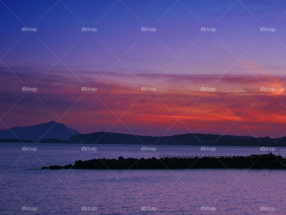 Purple sunset over La Pietra ( Naples - Italy ).