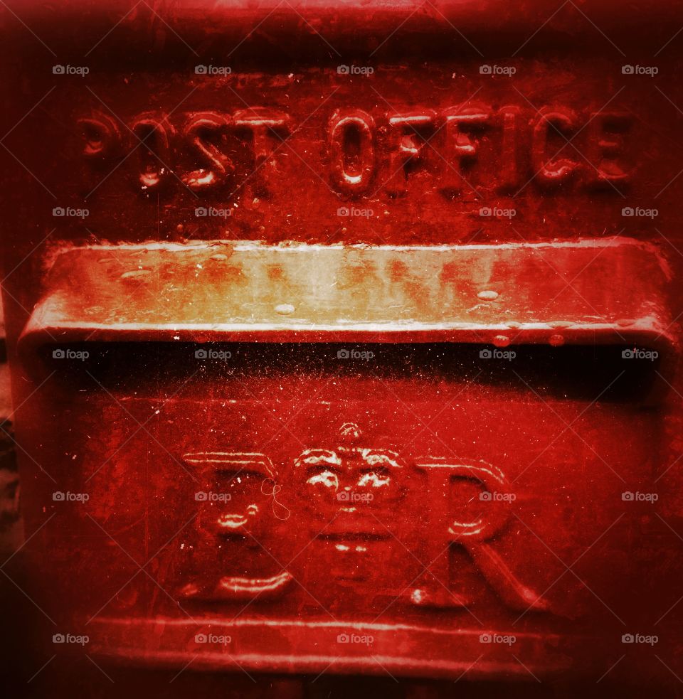 Communicate the old way. Post box in red