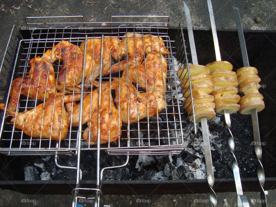 Fried chicken wings on the grill