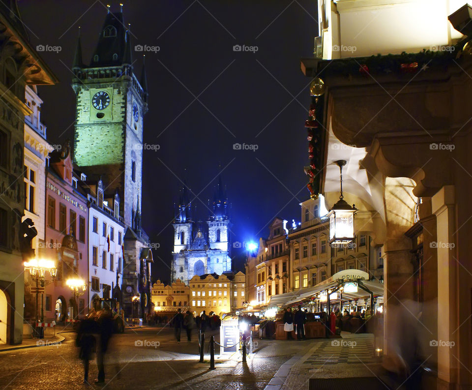 Prague Street autumn evenings suggest bright sadness. View on the old town square with a focus on the old town hall and the unique city clock with lunar calendar