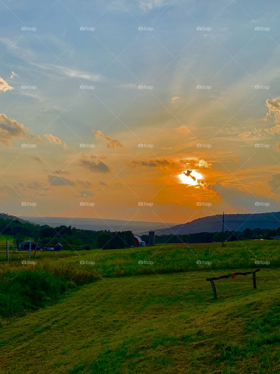 fiery skies setting down through the glorious mountains 