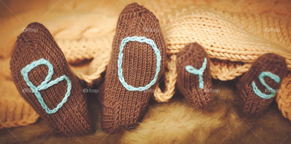 Close-up of two boy's feet