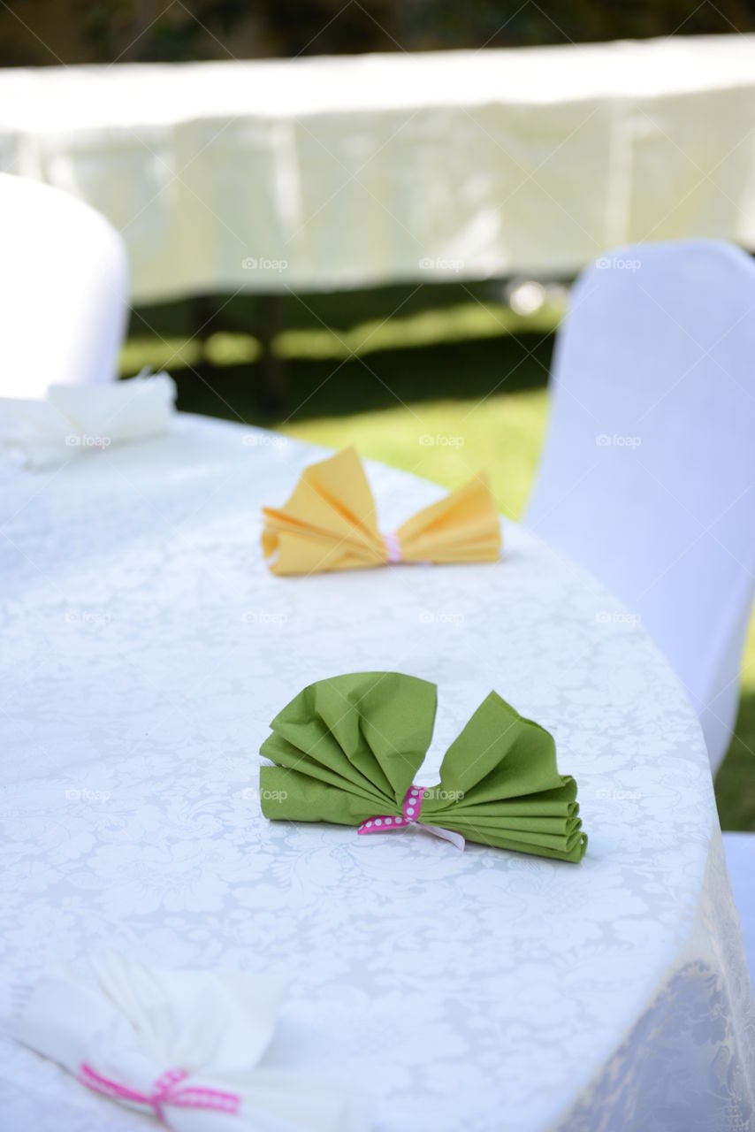 colorful napkins on a table decoration for a party