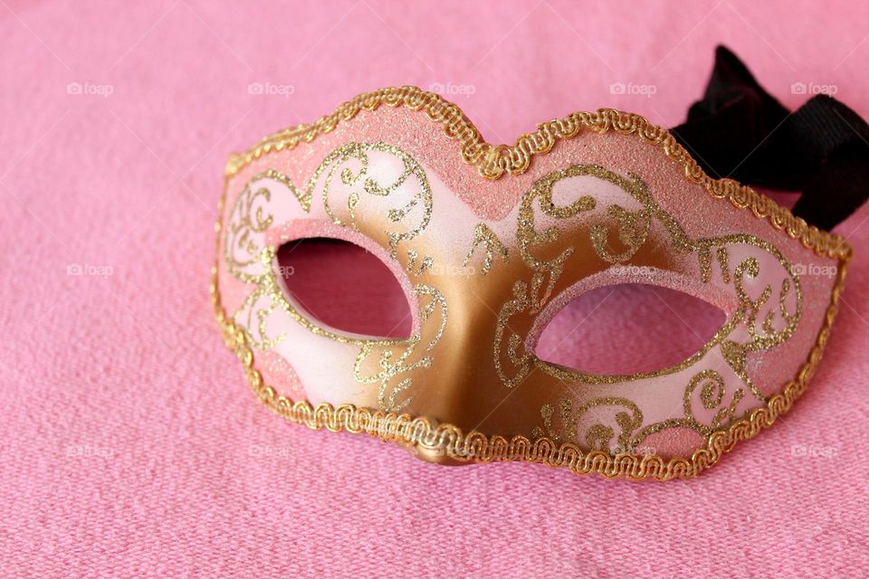 Pink and gold carnival mask