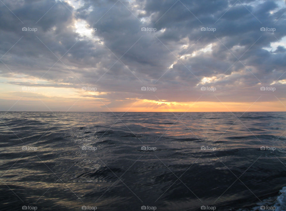 Idyllic view of sea during sunset