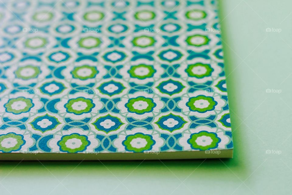 Green Color Story - design in shades of green on paper cover of notebook