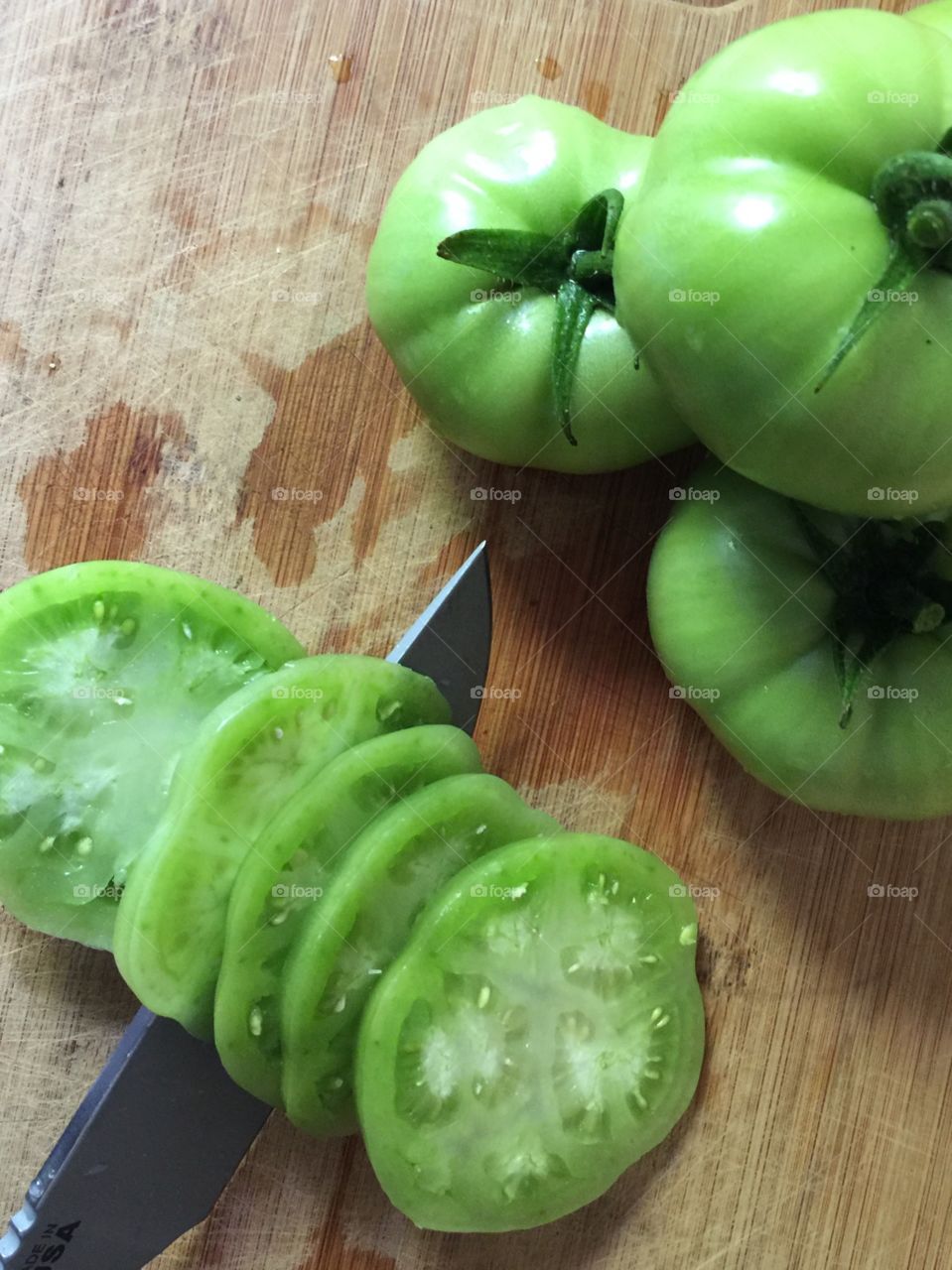 Sliced garden fresh green tomatoes 