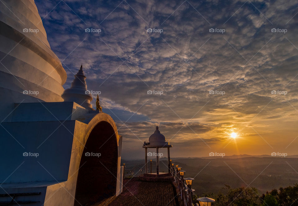 Beaitiful pagoda in sunrise moment at southern of Thailand