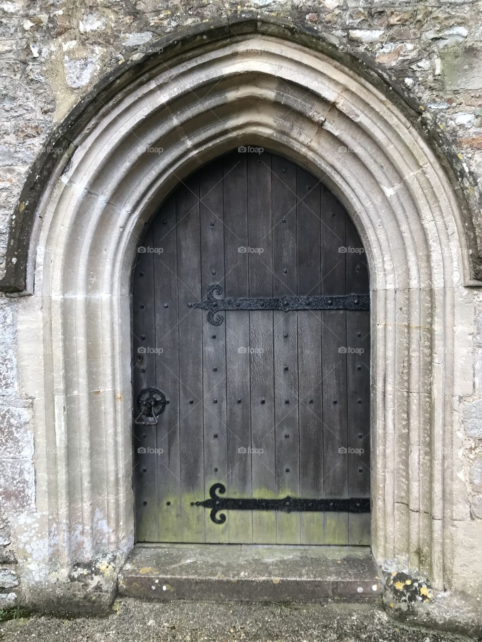 Traditional photo of this elegant church door, steeped in history both inside and out.