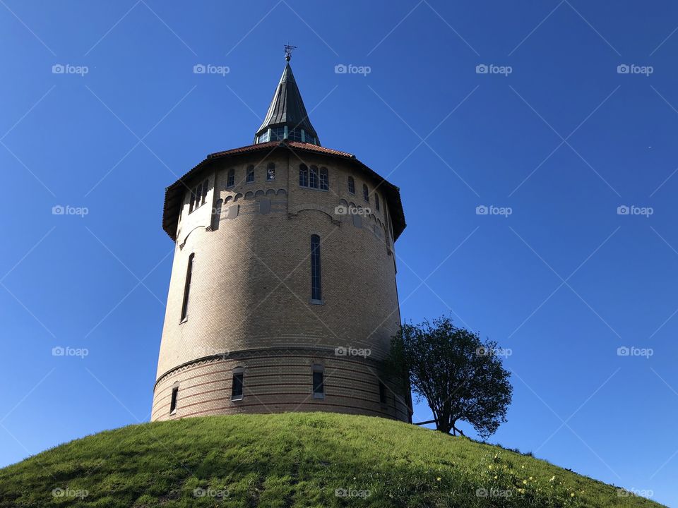 Castle tower on the hill, springtime Malmö Sweden