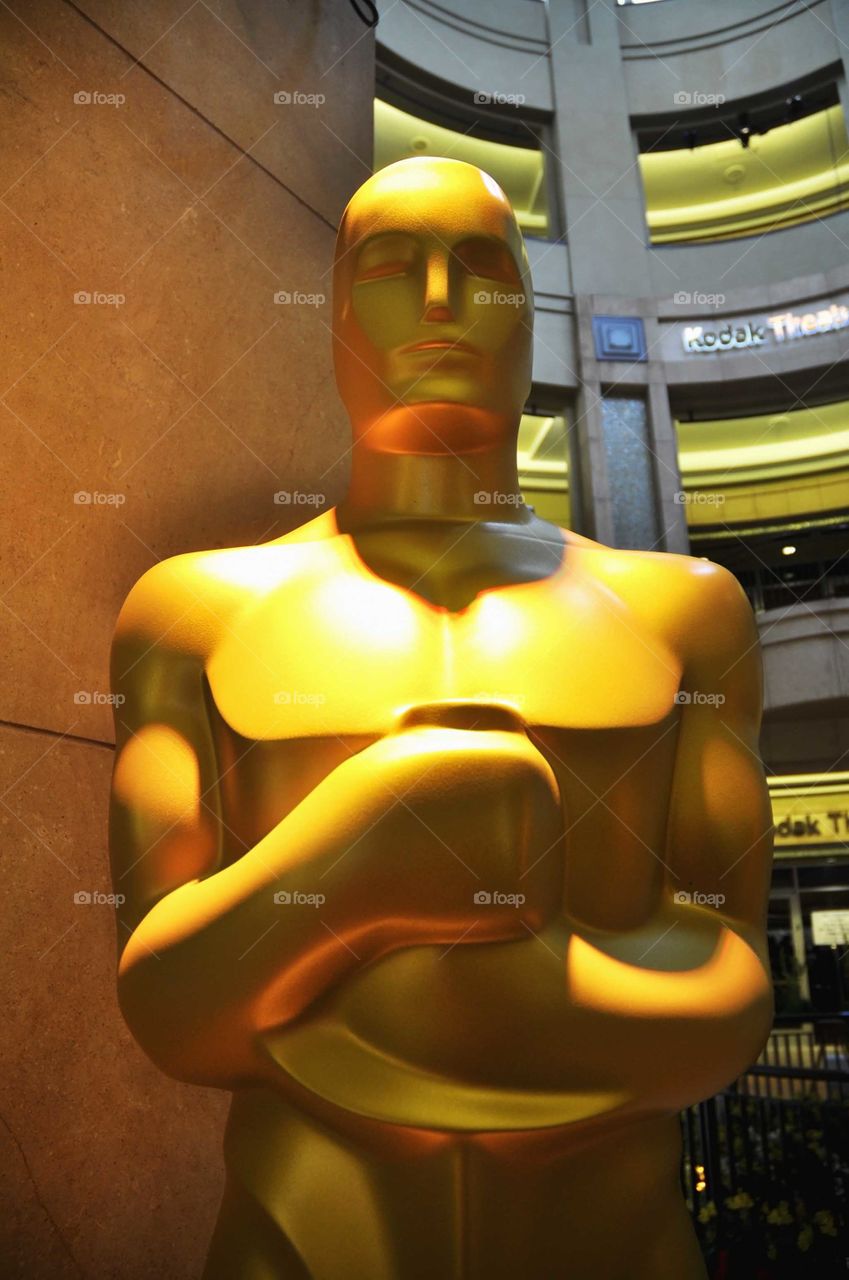 Large statue of the Oscar Award at The Oscars in Hollywood California.