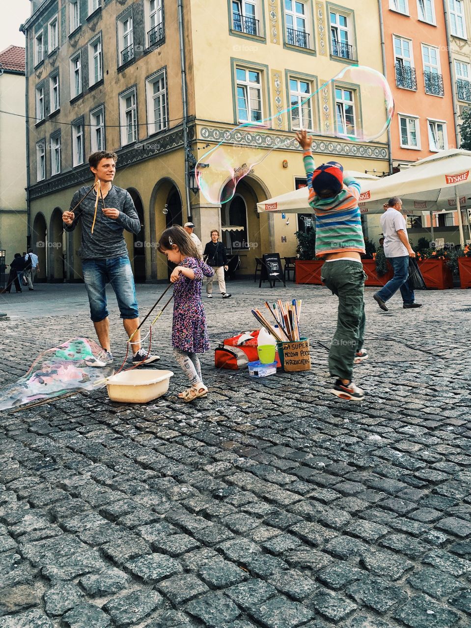 People blowing bubble