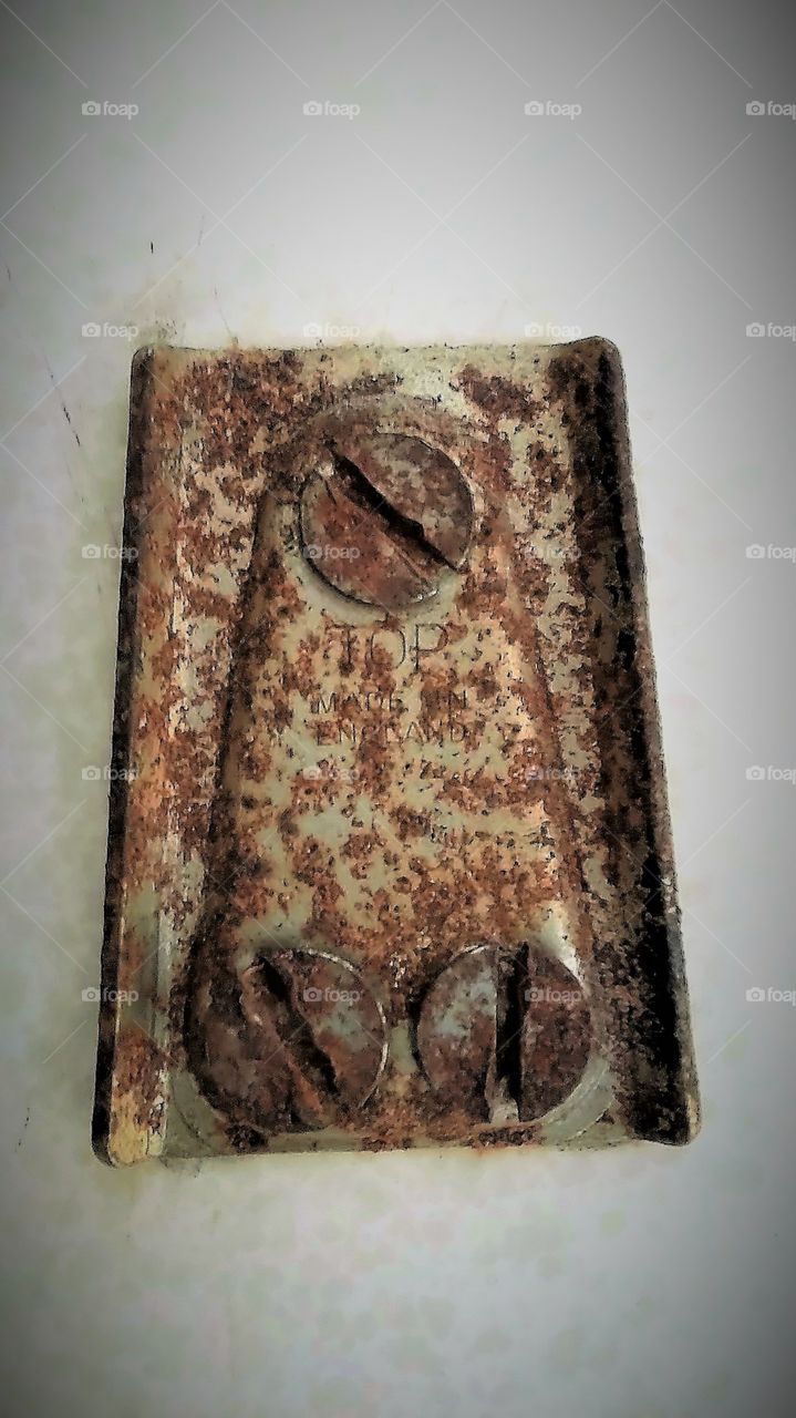 Rusty Can Opener Holder