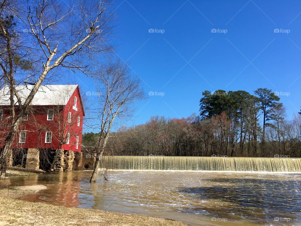 Red mill and waterfall