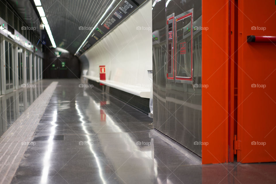 Orange and silver underground station