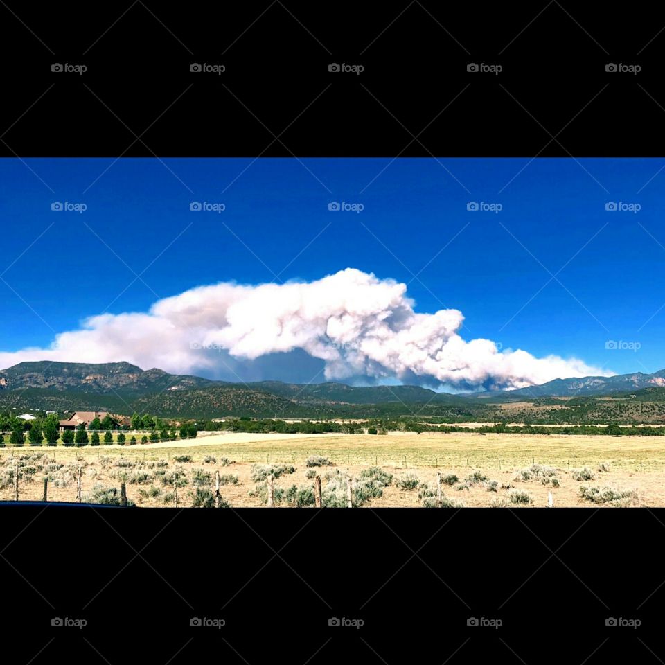 sky smoke desert mountain
