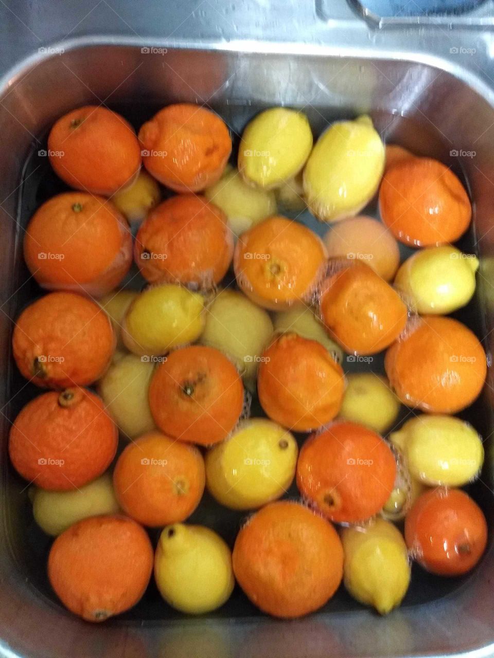 Washing citrus in the kitchen