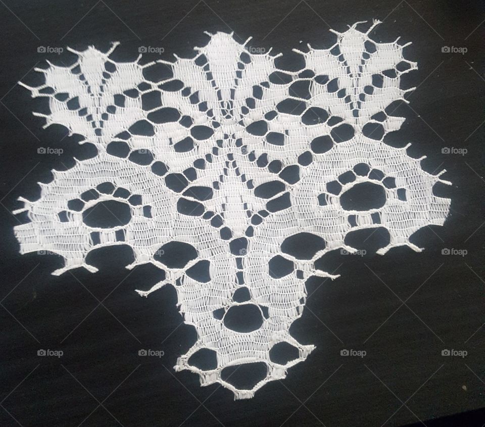 Whimsical design made out of cut lace