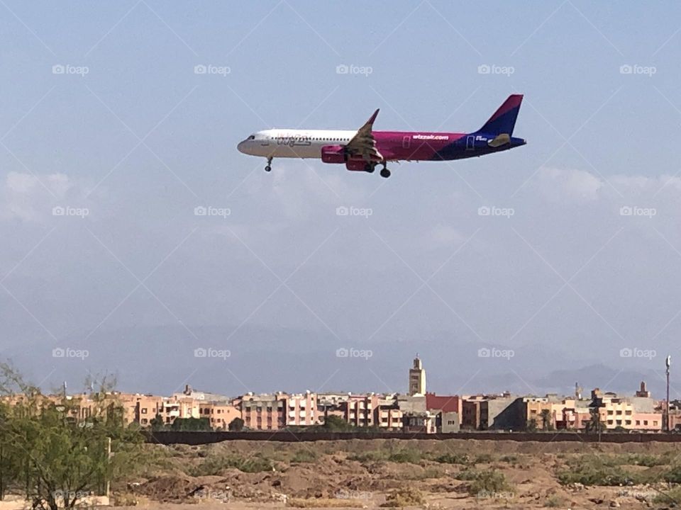 beautiful aircraft flying cross the blue sky