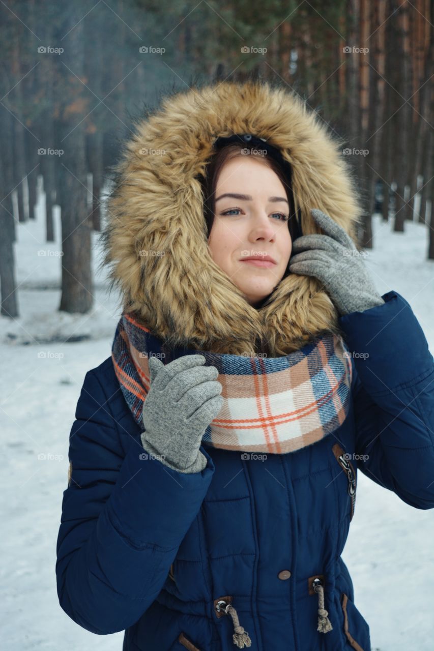 Beautiful woman wearing fur hat