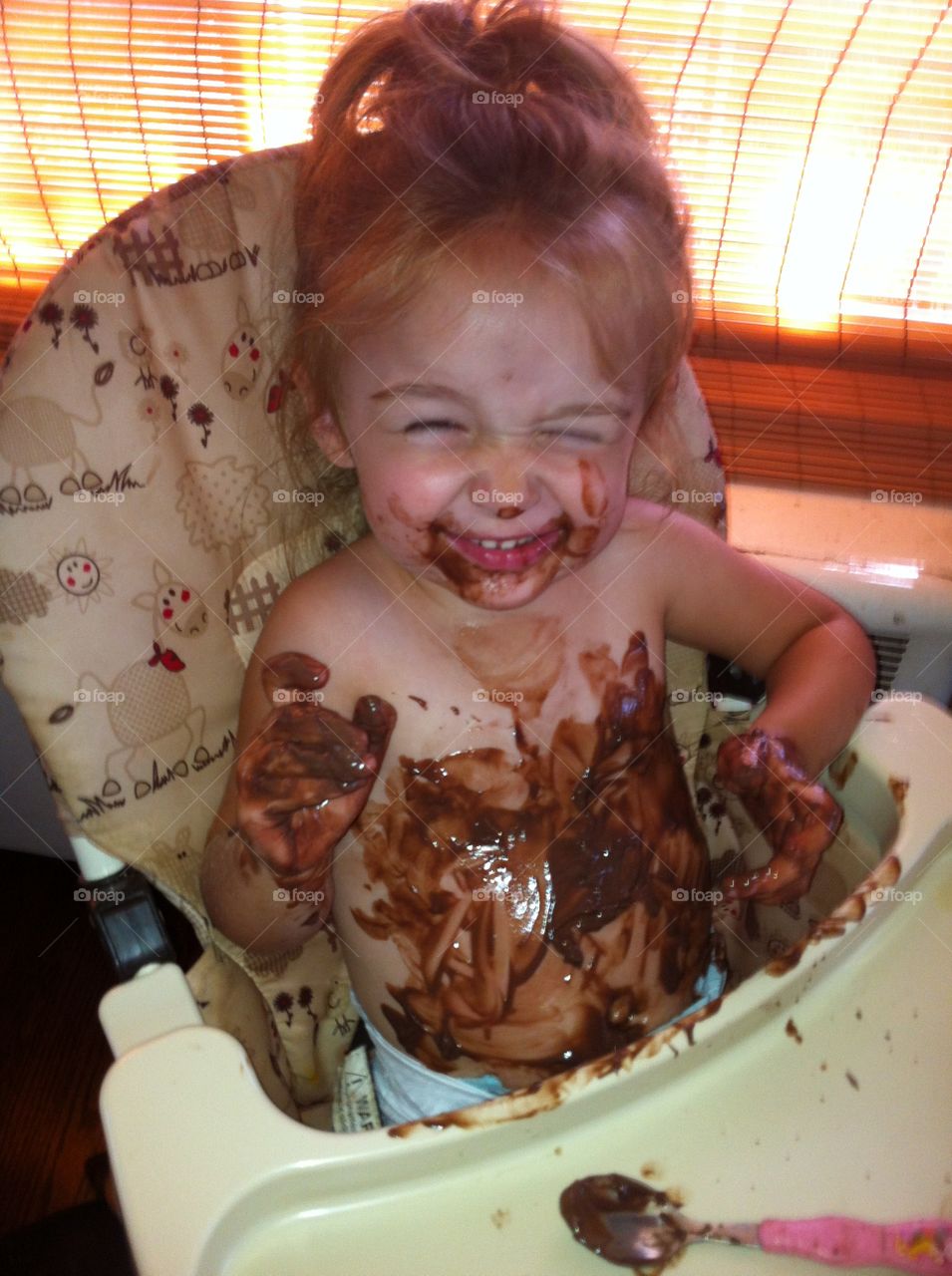 Pudding Goes in Your Mouth You Know. Toddler making a mess with chocolate pudding
