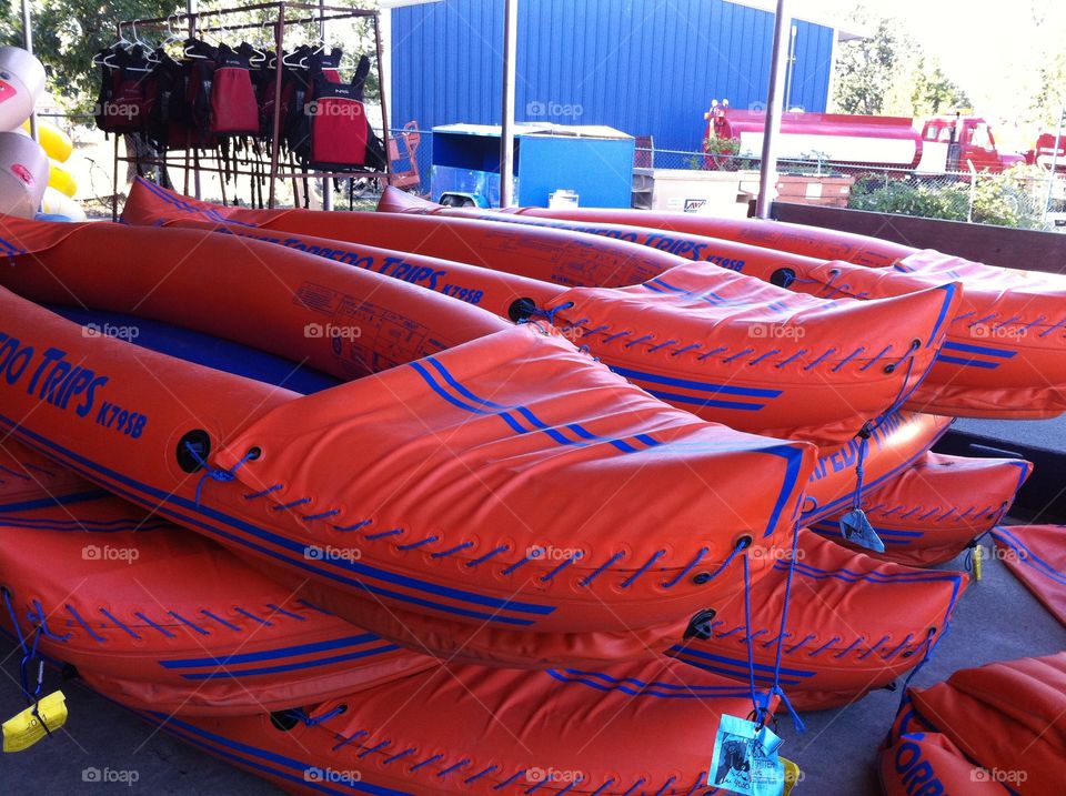 Inflatable kayaks stacked 