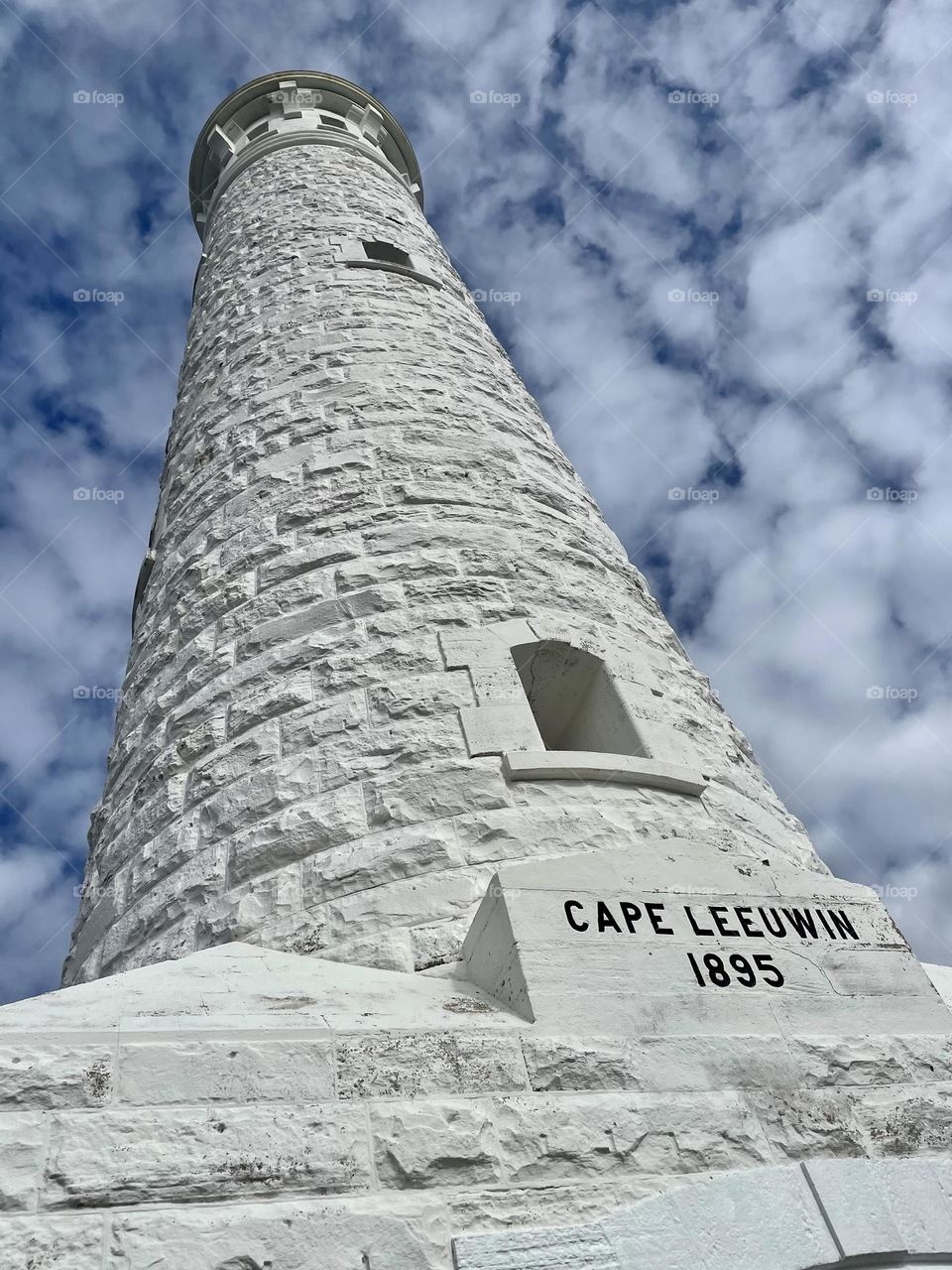 The old lighthouse of Cape Leeuwin standing tall into the clouds. Look up and look out. 