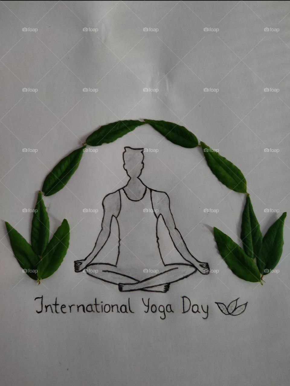International yoga day. Art replicates pranayama for human being, doing it in surroundings of greenery.