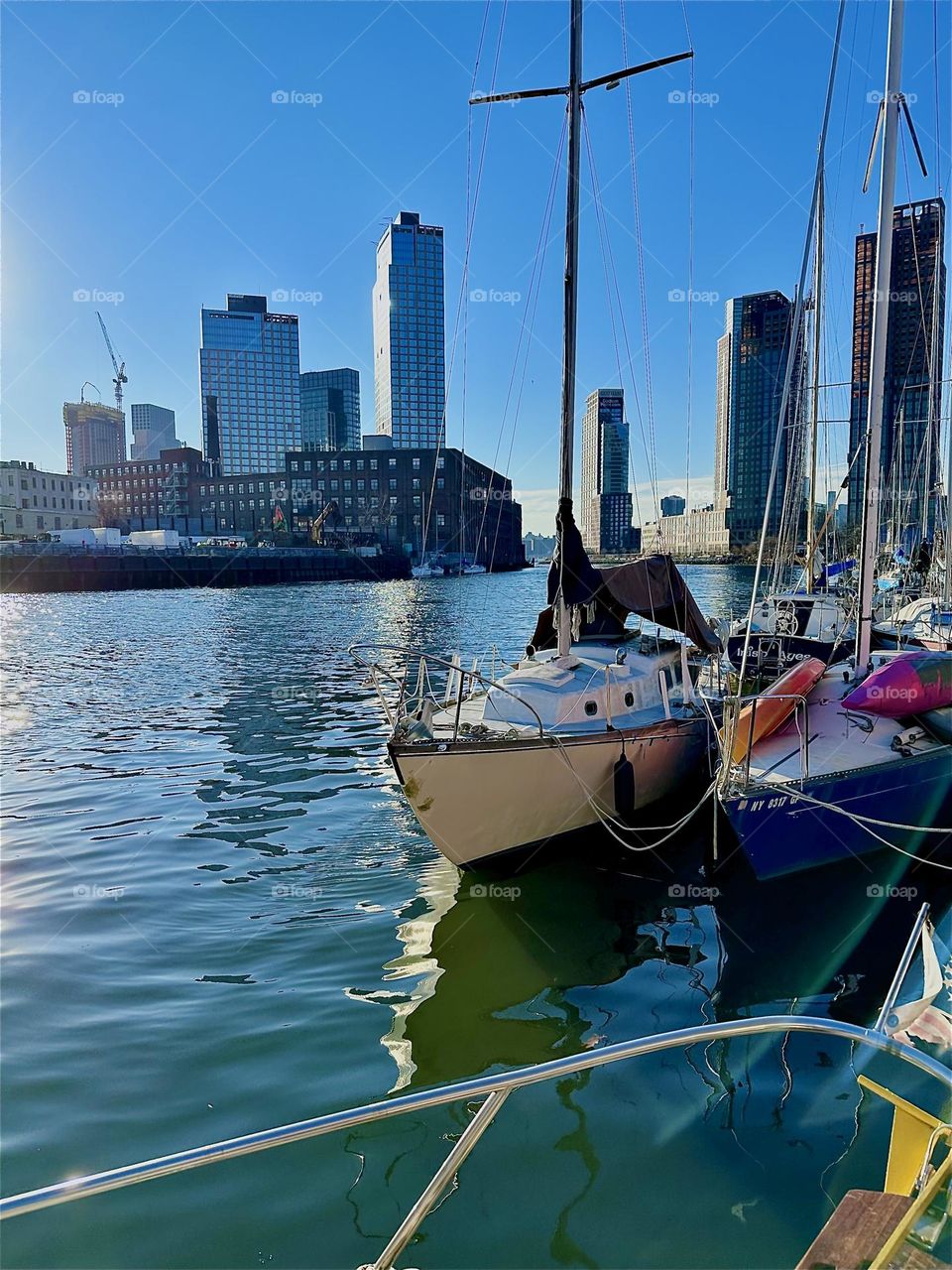 This is “Newtown Creek” by the “Pulaski Bridge” in LIC, Queens seen from aboard one of the boats here, a “28 foot 1969 Luhrs” cabin cruiser that I and my partner for many years, “Timothy Trespas” call home. 2023. Hypnotic Productions