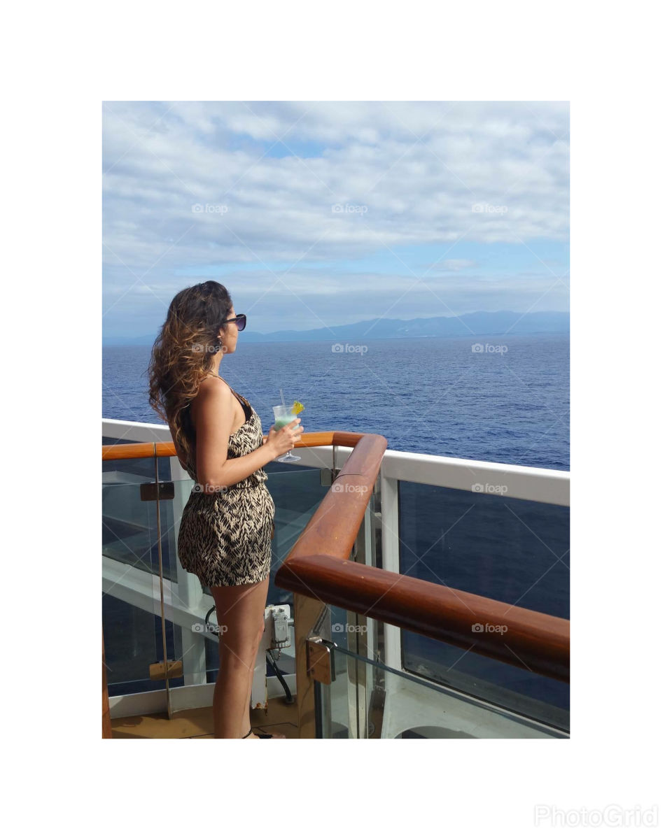 Wind in my hair and a drink in my hand 