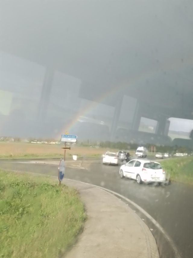rainbow seen from the bus