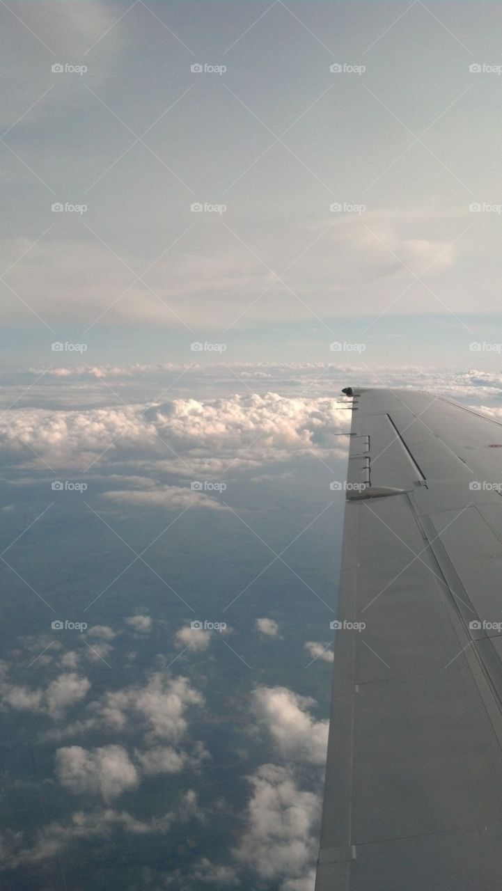 Airplane flying over the atlantic ocean