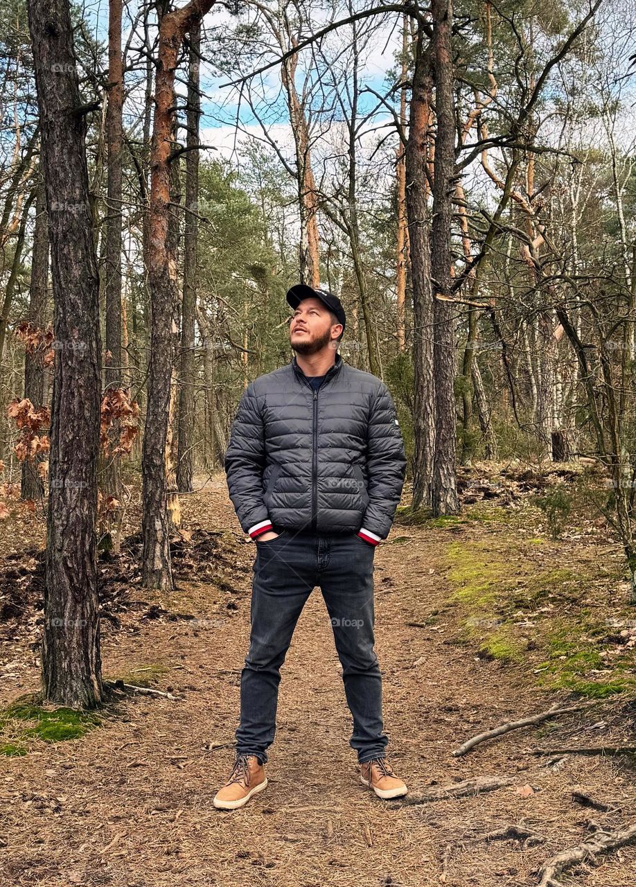 Man standing in a forest