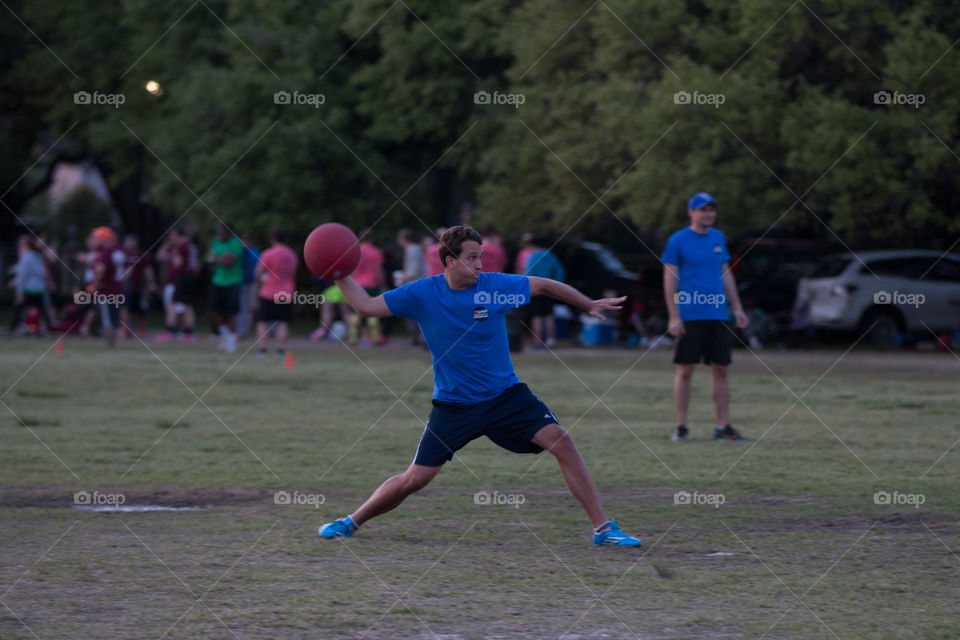 Man playing ball in the park