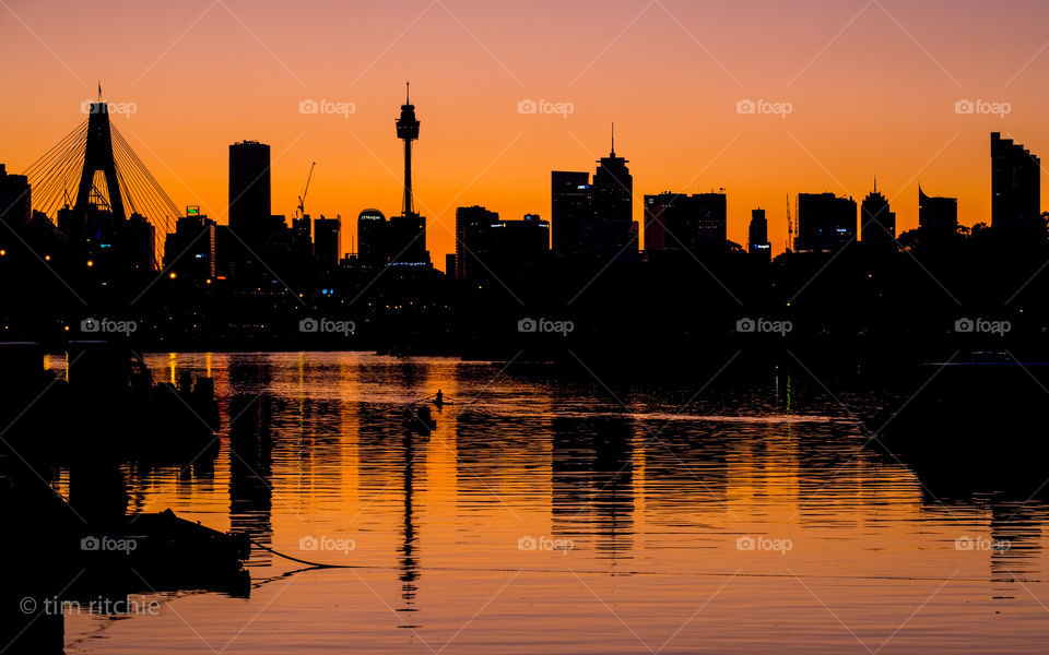 From last week when it was clear and warm... a rower at dawn on Blackwattle Bay, Sydney Harbour