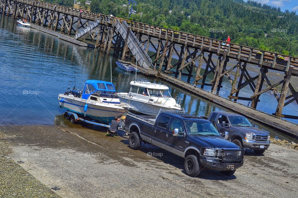 Pulling sports boats out of water. Pulling sports boats out of water